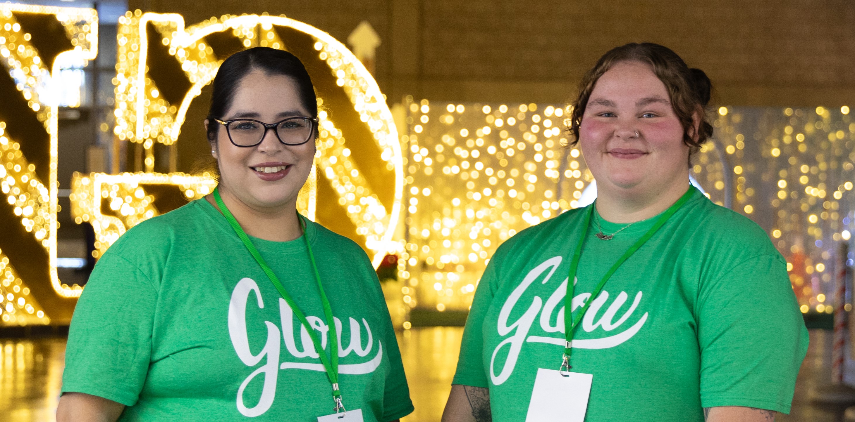 2 women working at Glow Christmas festival